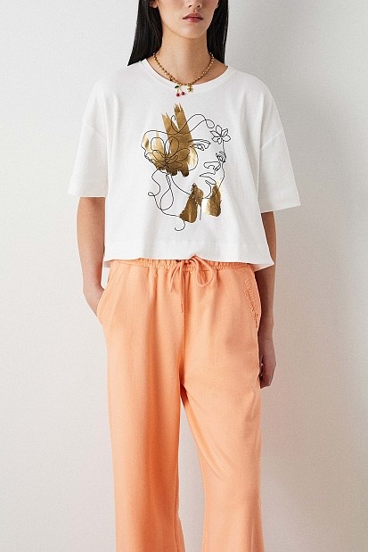 T-shirt με λούρεξ τύπωμα